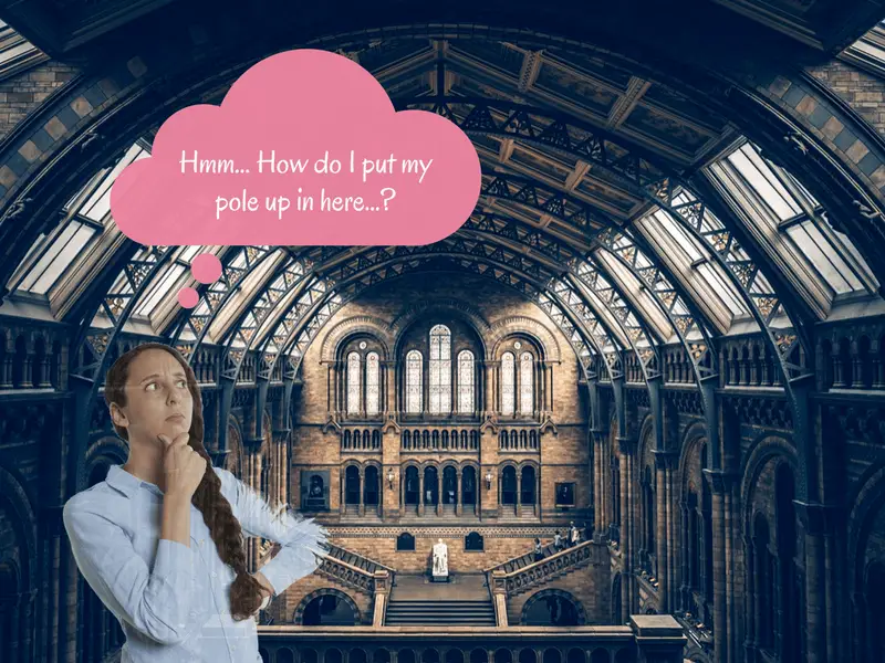 Hmm... How do I put my pole up in here...Woman looks confused at a fancy vaulted ceiling.