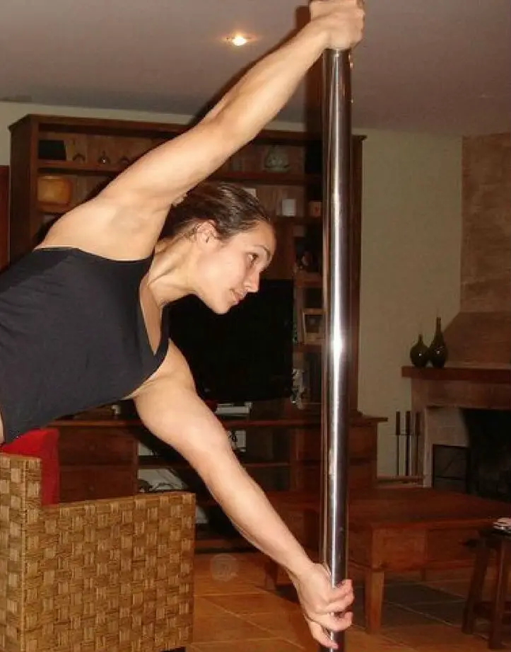 Pole Dancer doing True Grip